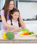 Plastic green toddler-safe knife used by mom and daughter to cut vegetables on a cutting board in the kitchen.