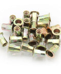 Top Shelf Carbon Steel Rivet Nuts M6 Thread Inserts Half Hex Nutsert Assortment Kit 60 Pieces Zinc Plated Yellow close-up view.