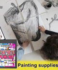 Hands drawing with graphite powder beside a package labeled 'Goodtake Graphite Powder 100% Pure' for painting supplies.
