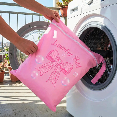 Person using Large Waterproof Travel Laundry Bag Set For Wet Dry Gear, Pink Bow, in front-loading washing machine