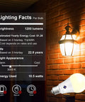 Outdoor Dusk To Dawn LED Sensor Bulbs Four Pack For Porch And Garage A19 Soft White 3000K 1200 Lumens installed in lantern