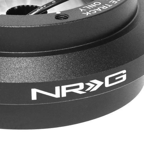 Dope Quick Release Short Hub Steering Wheel Adapter With 6X70mm Bolt Pattern And Clean Black Finish For Honda Civic Acura Integra JDM close-up view
