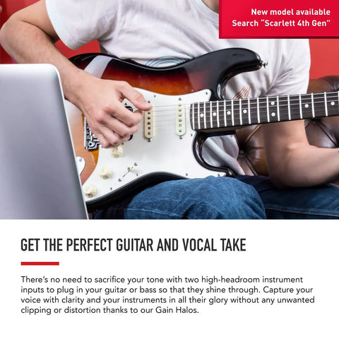 Person playing electric guitar connected to computer, showcasing audio recording with Scarlett 2i2 3rd Gen USB Audio Interface.