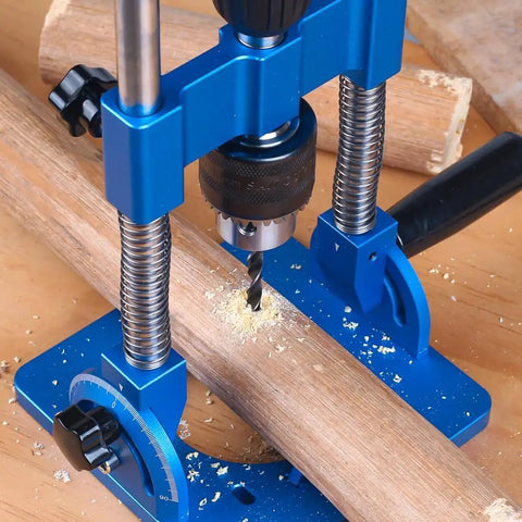 Close-up of Knockout Accuracy Portable Drill Guide And Angle Drill Jig For Perfectly Straight Holes Every Single Time, drilling into wood.