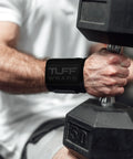 Man using 16 Inch Wrist Straps For Gym No Thumb Loops Durable Wrist Wraps For Powerlifting Weightlifting And Bench Press Support