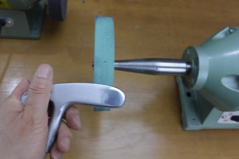 Six Inch Elastic Polyurethane Buffing Wheel Two Thousand Grit yields mirror polish on bench grinder with metal arbor.