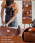 Leather tooling kit with roll-up organizer and tools; person cutting brown leather on workbench.