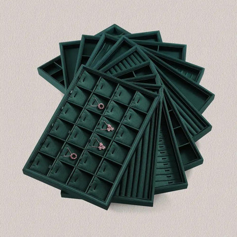 Top Tier PU Leather Jewelry Display Tray Featuring Twenty Four Secure Grid Slots For Rings Earrings And Brooches, dark green color, showcasing earrings.