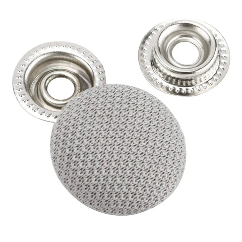 Close-up of metal snap rivets and grey fabric button from 60 Piece Universal Car Roof Headliner Repair Kit With Installation Tool