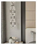 Sleek Modern Crystal Pendant Ceiling Light Featuring Premium Gold Chrome Chain Suspension Fixtures, showcasing crystal links and gold accents.