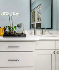 Installed Ten Pack 3 Inch Hole Center Black And Gold Cabinet Pulls Matte Black Hexagon Bar With Brushed Gold Bases on bathroom vanity