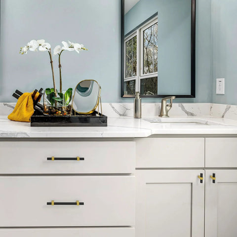 Installed Ten Pack 3 Inch Hole Center Black And Gold Cabinet Pulls Matte Black Hexagon Bar With Brushed Gold Bases on bathroom vanity