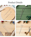 Stainless Steel Candle Wick Centering Pins Set, 20 Pieces For Precise Wick Placement And Easy Threading, 6 Inch Punch Needle Tool For Pro Level Candle Making And DIY Aromatherapy Crafts on wood surface