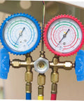 Close-up of pressure gauges with blue mini hand wheel valve handles, part of Blue Ball Hand Wheel Valve Handles Set Of 6 No Fuss Easy Install Rotary Mini Handwheel For Fluid Control Built To Last Durable And Resistant Design Decorative Accessory For Home Shop Or Industrial Use.