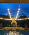 52 Ft Outdoor String Lights With 30 Incandescent Bulbs UL Listed Commercial Quality Edison Patio Cafe Market Lights hanging over patio