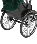 Close view of Retro Alloy Rickshaw Model Miniature Decor showcasing black zinc construction and detailed wheels.