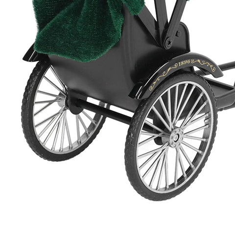 Close view of Retro Alloy Rickshaw Model Miniature Decor showcasing black zinc construction and detailed wheels.