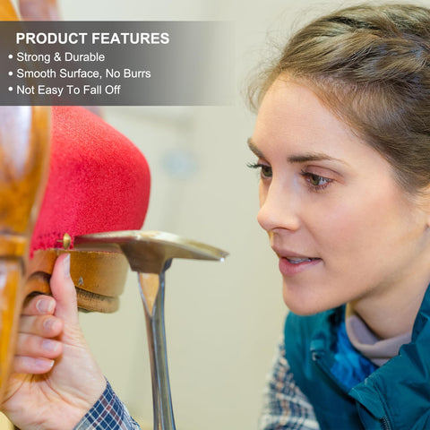 Close-up of a woman using a hammer on red upholstery with Straight Up Premium 200 Pack Heavy Duty Upholstery Tacks With Round Metal Thumb Nail Pins Vintage Hardware For Sofa Chair Fixing And Custom Furniture Craft Built To Last.