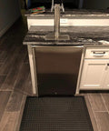 Heavy Duty Rubber Door Mat 36 By 24 Inches Grippy Non Slip Drainage Floor Mat in front of a bar counter indoors