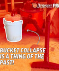 Dustopper 5 Gallon Heavy Duty Bucket For Shop Vac Systems next to vacuum, demonstrating durable dust collection for cleanup.
