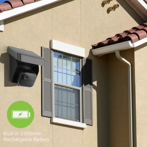 Solar Panel Charging Mount For Blink Outdoor 4th Gen And XT3 XT2 Cameras IP67 Weatherproof installed on house wall near window.