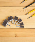 Heavy Duty 12pcs Abrasive Flap Wheels For Metal Polishing And Sanding Brown Discs on wood with tools, perfect for DIY tasks.