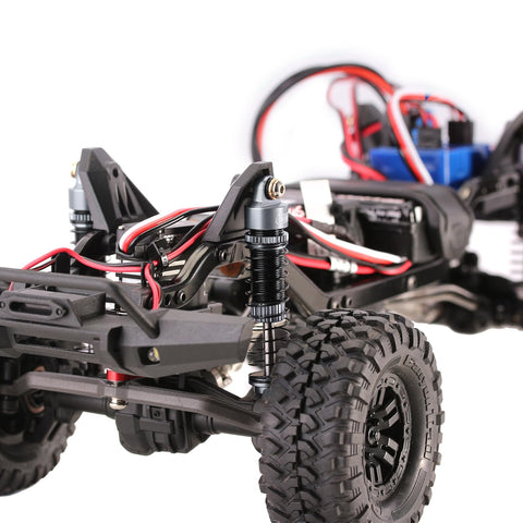 Close-up of Sweet 53mm 6g Oil Filled Threaded RC Shocks Absorbers For 1 By 18 TRX4M TRX4MT, aluminum body, dual spring rates.