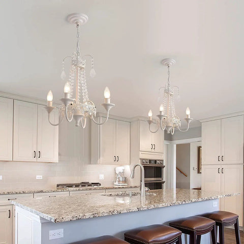 Crystal Mini French Country 4 Light Chandelier In White Finish Candle Style Ceiling Fixture For Dining Room Living Room Bedroom And Girls Room E12 Base Diameter About Eighteen Inches Height About Seventeen Point Nine Inches Adjustable Chain in kitchen setting