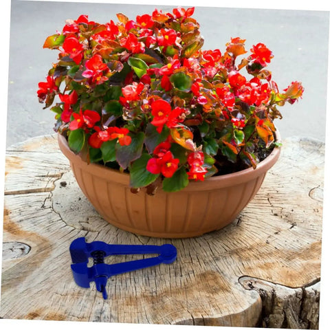 Heavy Duty 4.72 Inch Hand Clamp Vise For Woodworking And Metalworking Portable Steel With Fastening Knob And Slip Resistant Grip For Pro Grade Hold And Ideal For Home Shop Use With Precise Project Finishes, blue hand clamp vise beside potted flowers