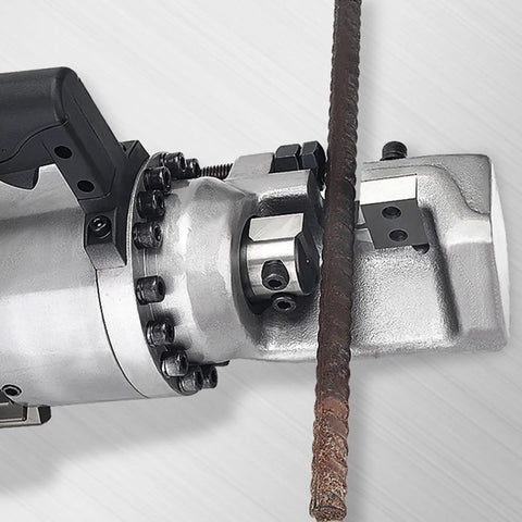 Close-up of Beefy 1600W 220V Electric Steel Bar Cutter And Rebar Bender cutting 25 mm steel bar on white background.