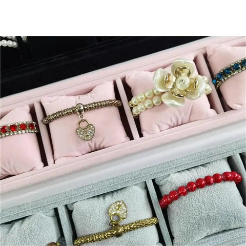 Two Pack Four Compartment Jewelry Organizer Tray In Grey Velvet With Soft Foam Bases That Keep Watches And Bracelets Secure Slick Display Holder To Store Your Dope Collection Crisp And Scratch Free showcasing bracelets in padded compartments.