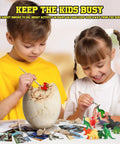 Children exploring Jumbo Dino Egg Dig Kit With 12 Surprising Dino Toys Hands On STEM Adventure For Kids Aged 5 To 7