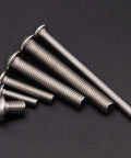 Top Shelf 50 Pack Of 10 32 By 3 4 Inch Hex Socket Button Head Cap Screws Built From Heavy Duty 304 Stainless Steel on black background.