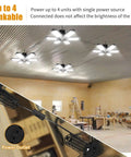 Workshop with Two Pack 185W LED Garage Lights Plug In Black Hanging Shop Light With 6 Adjustable Foldable Panels