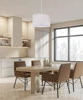 Game Changing Plug In Pendant Light With Adjustable Fifteen Foot Rope Cord And Chill Linen Fabric Shade On Off Switch hanging in modern dining area.