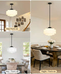 puncoll Vintage Black Milk Glass Pendant Light, 15.7'' White Chandelier in dining room with table set, turned on at night.