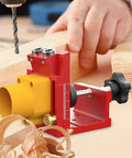 Top Shelf Aluminum Drilling Guide Jig For Cabinet Assembly And Woodworking With Zero Hassle Depth Controls showing drilling alignment on wood.