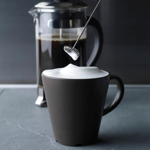 Steam Free Milk Frother That Works Without Electricity Satin Finish 18/8 Stainless Steel Whisk in foam on coffee mug