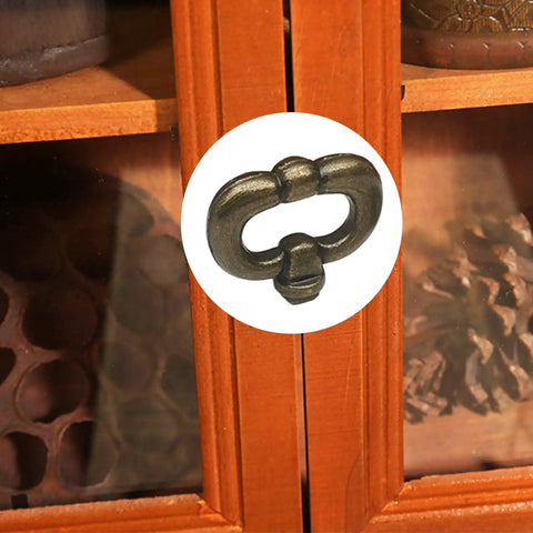 Two Pack Vintage Style Drawer Knob Ring In Antique Bronze mounted on wooden cabinet
