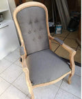 Gray upholstered chair with brass nailhead trim from Brass Nailhead Upholstery Strips Kit For Sofas Headboards And Benches, 9.5mm Brass Tacks