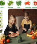 Children preparing food with Indoor 9 Layer Hydroponic Tower Garden Kit For Green Vegetables, Fruits And Herbs in the background