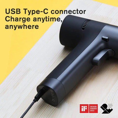 Cordless Brushless Drill Kit 12V With LED Display, USB-C charging, black handle resting on wooden surface