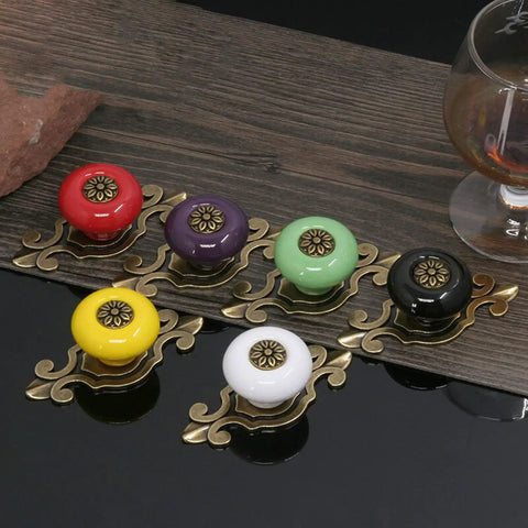 Top Shelf Vintage Ceramic Cabinet Knobs And Dresser Pulls Featuring Heavy Duty Zinc Alloy Backplates Breezy Hardware Swap For Kitchen Cupboards And Vanity Refresh 10 Pack with various colorful ceramic knobs on display.