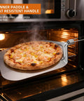 Must Have Pizza Peel Set With Cutter Rocker, Aluminum Peel, Foldable Handle lifting pizza from oven