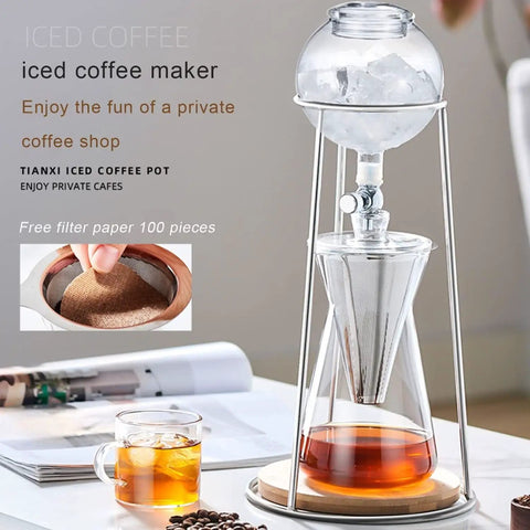 Top Shelf Cold Brew Drip Tower And Ice Coffee Maker With Solid Reusable Filter Dripper and Smooth Adjustable Flow Valve For Chill Ready Coffee Sips And No Mess Home Brewing, with ice and brewed coffee in glass.
