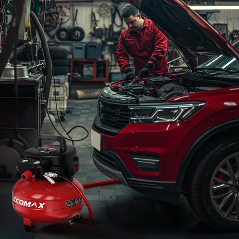 Mechanic using 6 Gallon Pancake Air Compressor 150 PSI Portable Oil Free With 10 Piece Accessory Kit in car garage