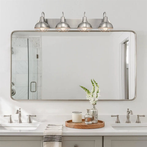36-Inch 4-Light Modern Industrial Vanity Light With Metal Cage Shades In Brushed Nickel Finish for bath and powder room installed above mirror.