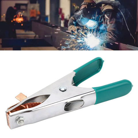 Hot Welding Ground Clamp With Massive Copper Alloy Body For 300 Amps, close-up of copper clamp with green handles.