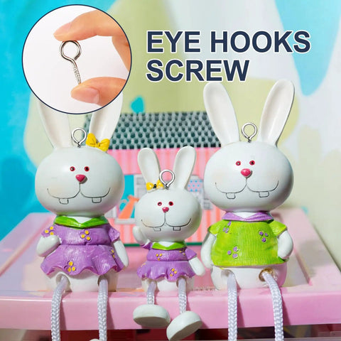 Heavy Duty 1 Inch Eye Screws Hooks Set 150 Pack Screw Eyes For Wood Hanging Artwork Ropes And Light Loads Tough As Nails Pro Grade Iron Ring Bolts For Indoor Outdoor Use displayed with decorative bunnies.