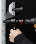 Using the 2-In-1 Rivet Gun And Rivet Nut Adapter Kit For Cordless Drills With Carry Case, Fits 18V-24V Tools on metal frame.